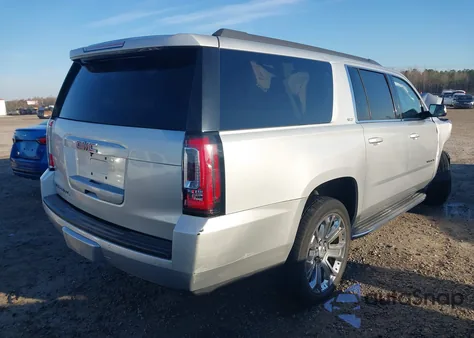 2015 GMC Yukon Xl 1500 Slt z USA, uszkodzony, nr VIN 1GKS2HKC2FR687614